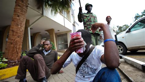 Kenyan riot police beat protesting students