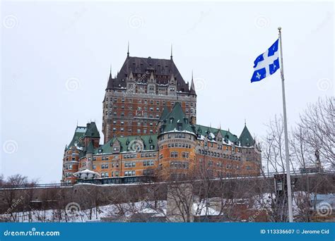 View of Frontenac Castel Chateau De Frontenac, in French in Winter Under the Snow with a Quebec ...