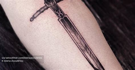 Blackwork style sword tattoo done on the calf.