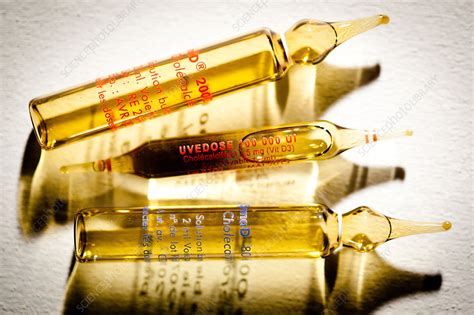 Glass ampoules of vitamin D - Stock Image - C032/8002 - Science Photo Library