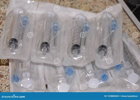 Packed Medical Syringes with Needles in Plastic Packaging. Stock Photo ...