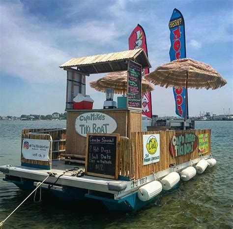 Cap'n Mike's Tiki Boat is a floating concession stand that delivers ...