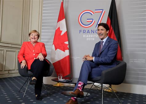 Justin Trudeau rocks Rebel Fashion's Dress Purple Socks at 45th G7 sum