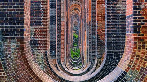 Under the railway Ouse Valley Viaduct on the River Ouse, Balcombe, West ...