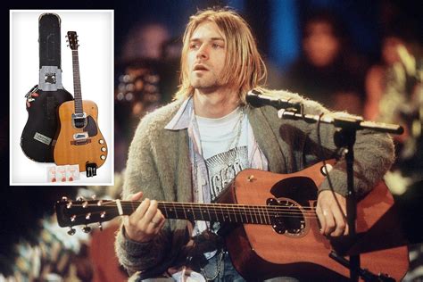 Kurt Cobain's iconic acoustic guitar from Nirvana's MTV Unplugged performance sells for record £ ...