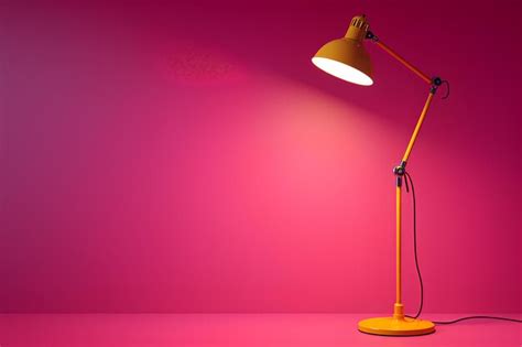 Premium Photo | A yellow lamp on a pink background