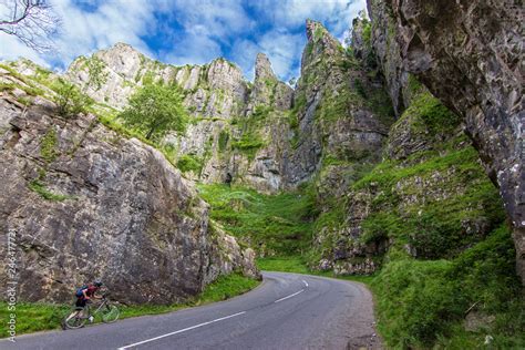 The amazing steep walls of Cheddar Gorge inside Mendip Hills is an awe limestone gorge on an ...