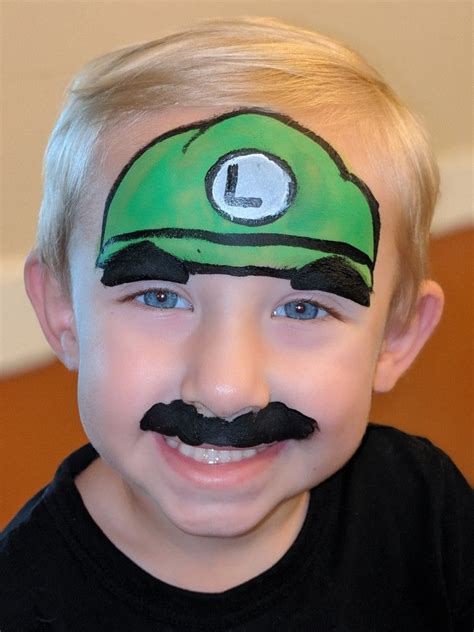 Luigi face painting #mario #luigi #facepainting #boysfacepainting Face Painting For Boys, Face ...