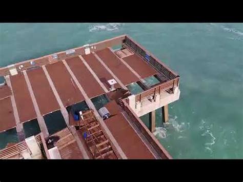 Drone video shows damage to Juno Beach Pier - YouTube