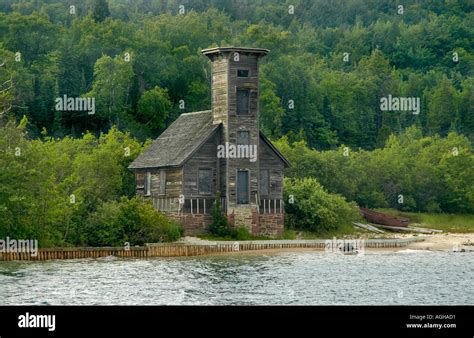 Old wood lighthouse pictured rocks hi-res stock photography and images - Alamy