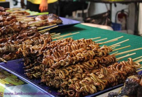 Isaw ng Manok - barbecued chicken intestines. Filippino street food ...