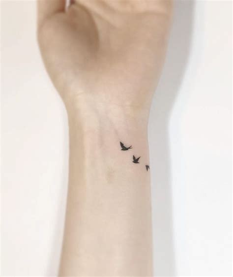 Small Bird Tattoo Wrist - TATTOO ON HAND