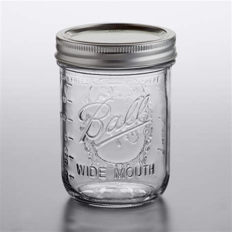 Ball 66000 16 oz. Pint Wide Mouth Glass Canning Jar with Silver Metal Lid and Band - Bulk - 12/Case