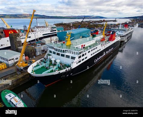 Glen Sannox ferry in dry dock at Greenock. Three other Caledonian Macbrayne ferries are ...