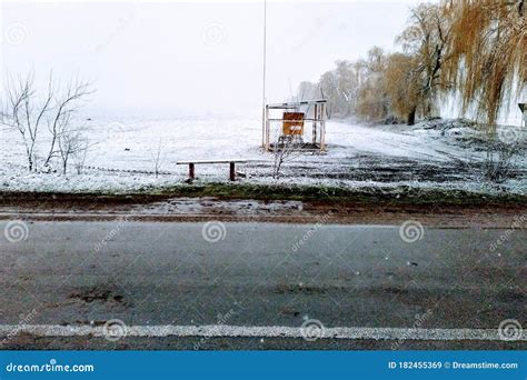 Road with Bus Stop and Field at Winter Snowy Time Stock Image - Image ...