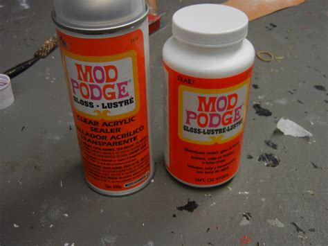 I'm using Mod Podge to use as the glue/sealer/finish over my pictures so that they stick to the ...
