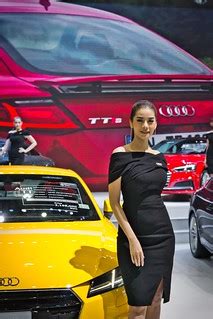 Beautiful presenter with yellow Audi TT Coupe at the 34th … | Flickr