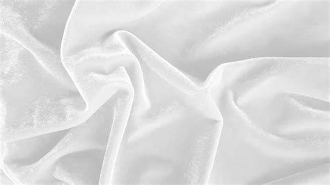 White velvet fabric texture used as background. Empty white fabric background of soft and smooth ...