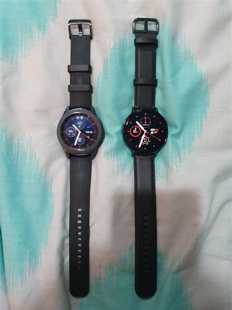 Galaxy Watch 42 mm on the left. Galaxy Watch Active 2 44 mm on the right. Shown here with their ...