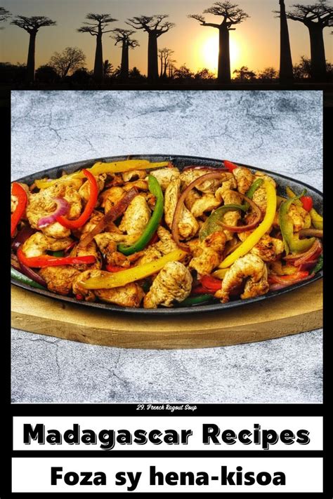 a plate full of chicken and peppers with the sun setting in the backgroud