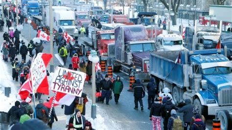 Freedom Convoy: Truckers cause chaos in Ottawa after second day of protests - BBC News