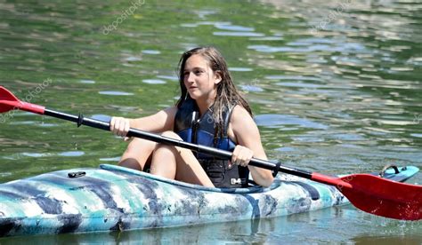 Teen Girl Kayaking — Stock Photo © noonie #27091345