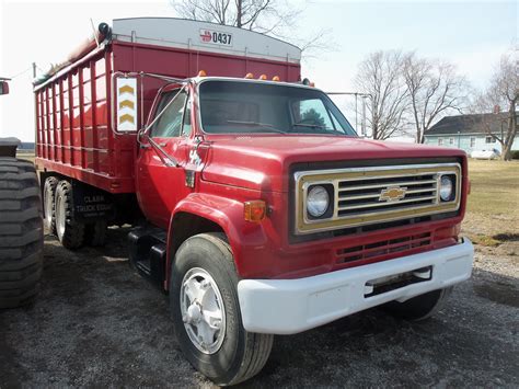 Red Chevrolet C65 tandem grain truck | Chevrolet trucks, Trucks, Farm trucks