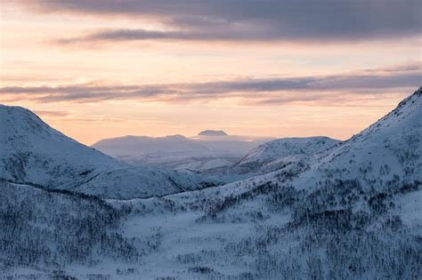 Premium Photo | Scenery snowy mountain range with colorful sky on peak