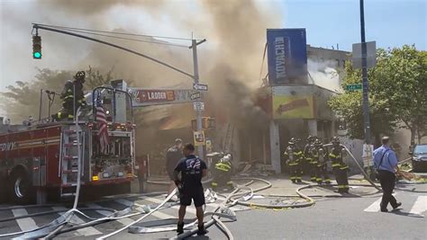 Seven firefighters injured as crew of 168 tackle huge multi-store Brooklyn fire in Williamsburg ...