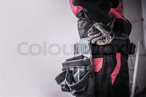 Construction Worker With Tool Belt. | Stock image | Colourbox