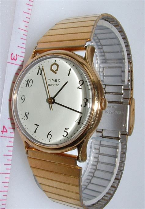 Vintage Mens 1982 Timex Quartz Watch Gold Color With Stainless