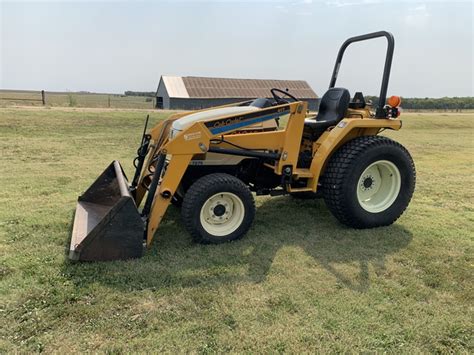 COMPACT LOADER TRACTOR 4WD. 787 HOURS. 1996 Cub Cadet 7275 - Nex-Tech Classifieds