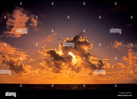 sunset dramatic clouds Stock Photo - Alamy