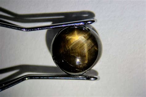 Natural black star sapphire 2.43 ct - Round cabochon - Black - Video