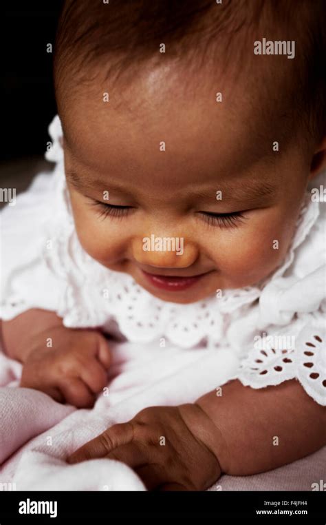 Baby girl laughing Stock Photo - Alamy