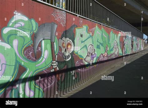 Graffiti on a concrete wall Stock Photo - Alamy