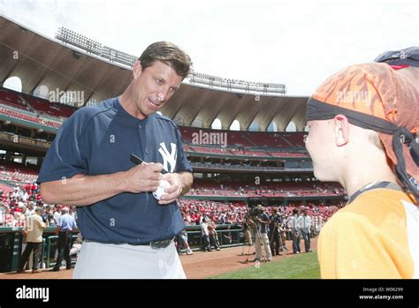 New York Yankees Tino Martinez signs an autograph for Tanner Cox, a 10 ...