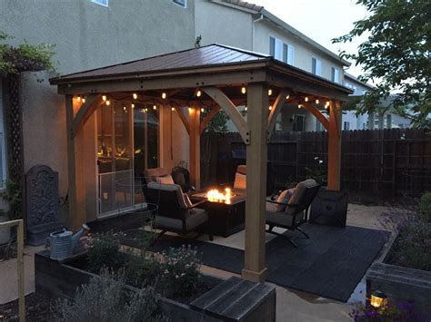 Yardistry 12x12 cedar gazebo from Costco. This thing is amazing. Adds a new dimension to your ...