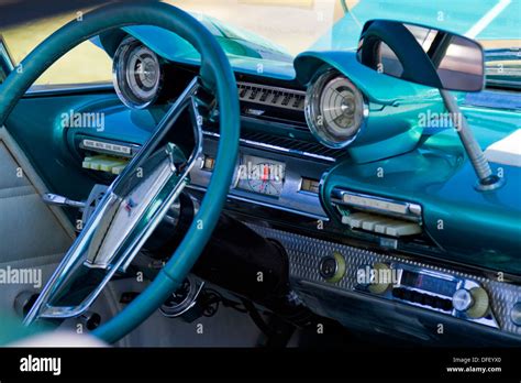 Interior closeup showing details of dashboard of a 1961 Plymouth Stock ...