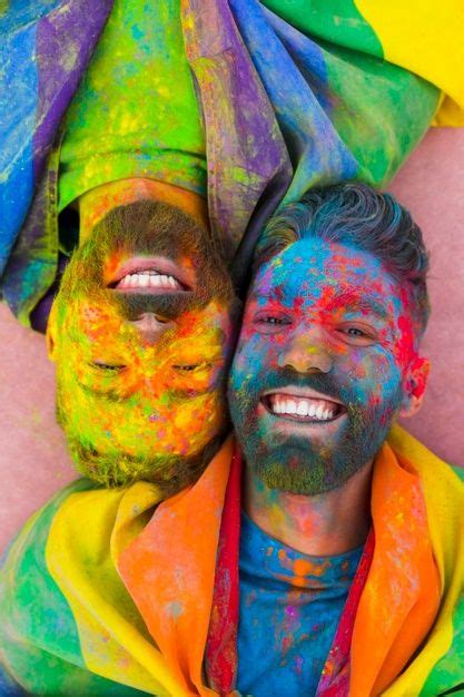 Portrait of joyful gay couple in love soiled in paint. Download it for free at freepik.com! # ...