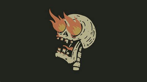 a skull with flames on it's face in the middle of a dark background