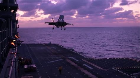 USMC F-35B sunset vertical landing on USS America (LHA 6) - YouTube