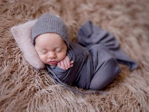 Sleeping newborn baby boy stock image. Image of infant - 117369213