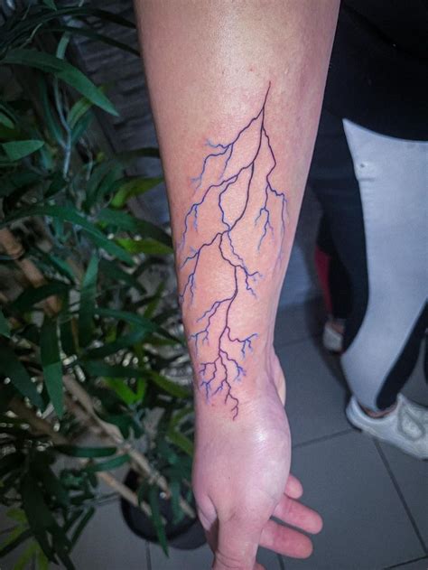 Blue Lightning Tattoo | Lightning tattoo, Purple tattoo ink, Purple tattoos