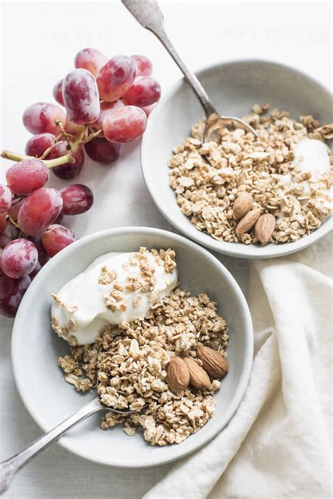 Bowls of cereal and yogurt stock photo