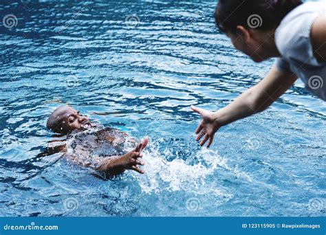 Man Being Rescued from the Water Stock Image - Image of friend, pool: 123115905