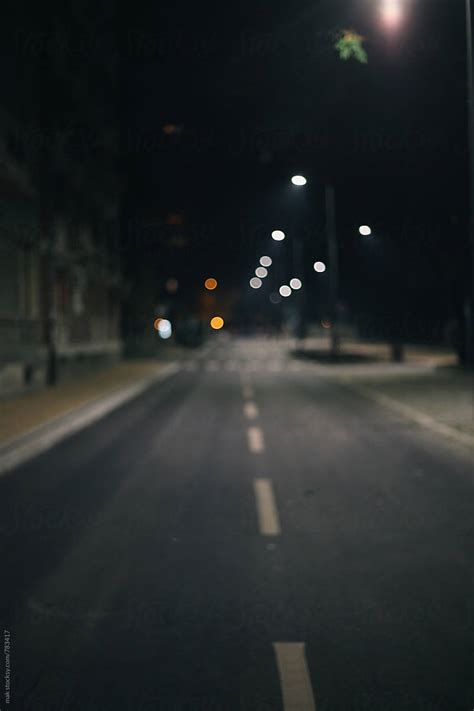 "Empty Street During The Night. Blurry." by Stocksy Contributor "Mak ...