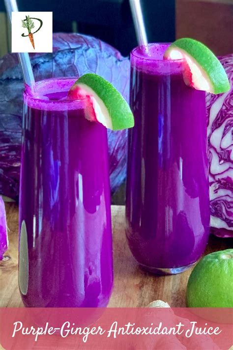 bright purple red cabbage juice in glasses with steel straws and limes ...