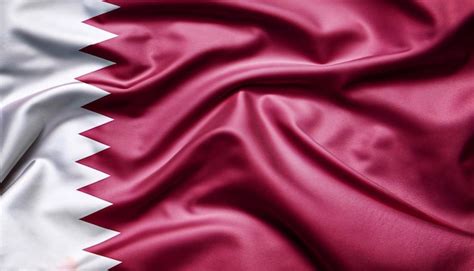 Premium Photo | Flag of qatar with folds with visible satin texture