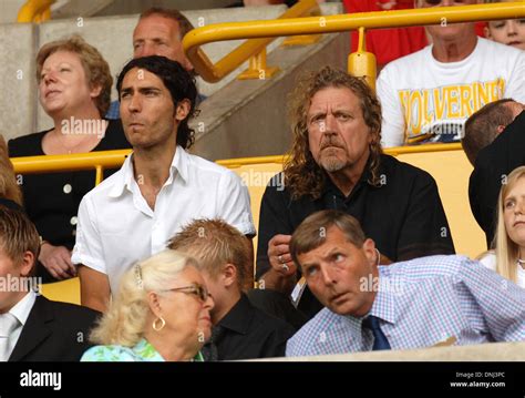 Rock singer Robert Plant and his son Logan watching Wolverhampton Stock Photo: 64936996 - Alamy